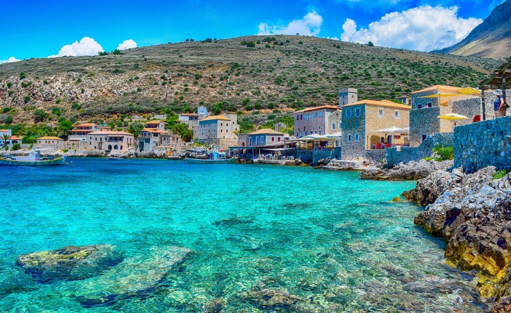 clear blue waters at limeni sea side village